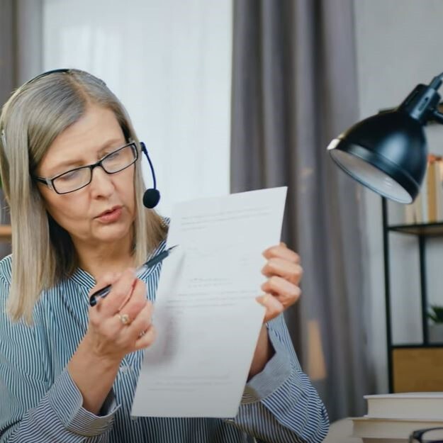 VT woman wearing headset
