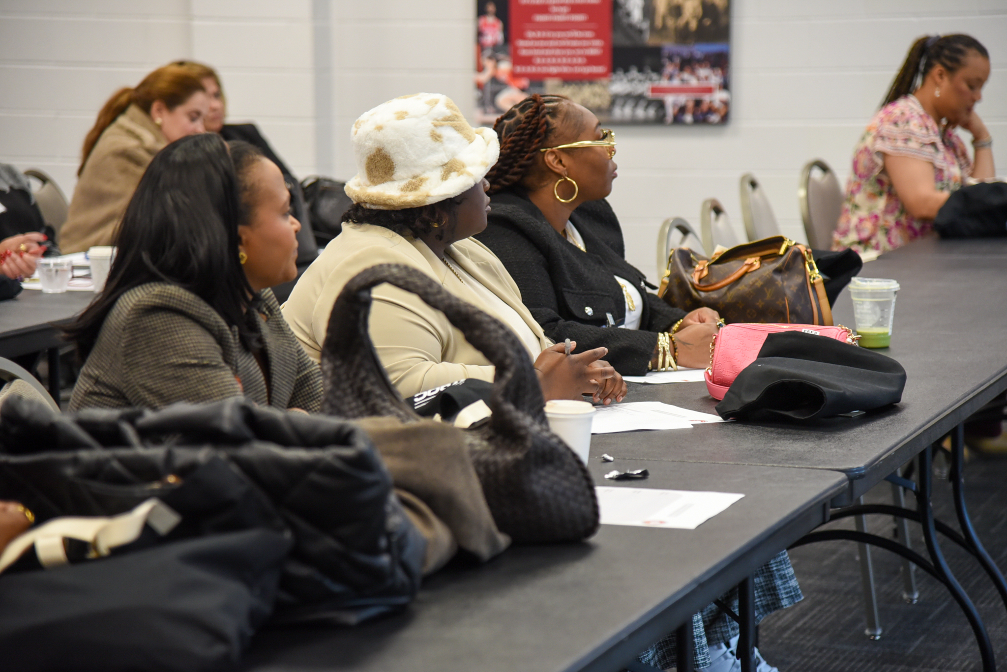 women in a classroom looking at instructor